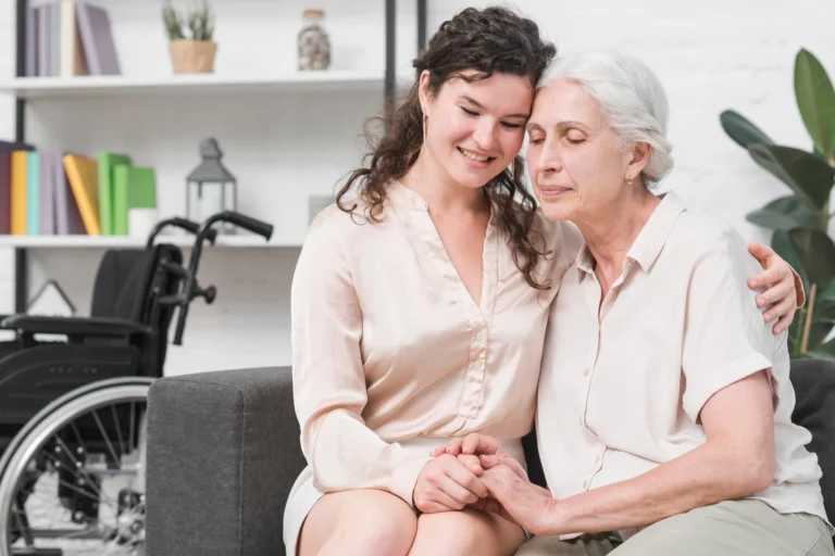 young-daughter-sitting-sofa-embracing-her-mother_2